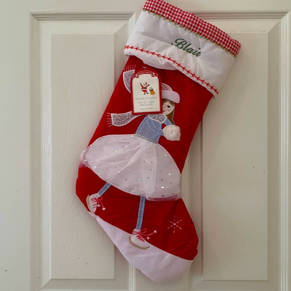 Pottery Barn kids quilted Christmas stocking, brown hair ice skater.